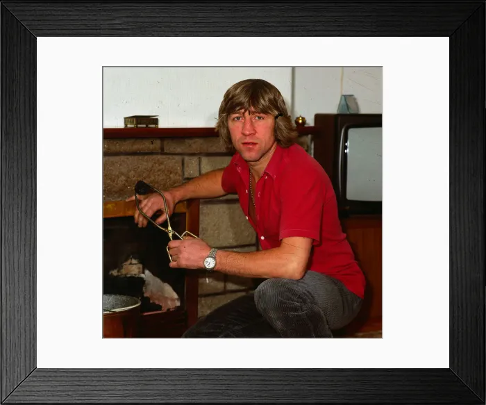Framed Print : Ken Buchanan boxer November 1982 In house living room holding piece of coal in Framed Print : Ken Buchanan boxer November 1982 In house living room holding piece of coal in