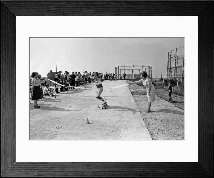 Framed Print : Demonstration of skateboarding skills on the slalom at the Cambridge Skatepark
