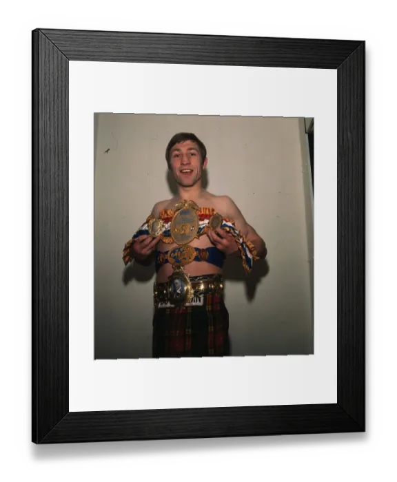 Framed Print : Ken Buchanan boxer 1974 Holidng collection of boxing belts including Lonsdale Belt Framed Print : Ken Buchanan boxer 1974 Holidng collection of boxing belts including Lonsdale Belt