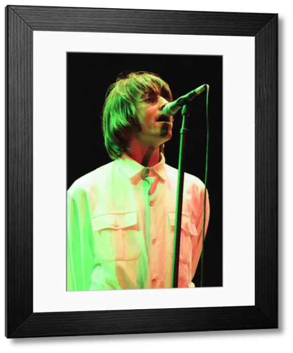 Framed Print : Oasis in concert at Knebworth, Hertfordshire. Liam Gallagher. 11th August 1996 Framed Print : Oasis in concert at Knebworth, Hertfordshire. Liam Gallagher. 11th August 1996