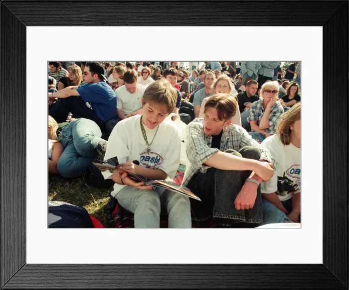 Framed Print : Fans watching Oasis in concert at Knebworth, Hertfordshire. 11th August 1996 Framed Print : Fans watching Oasis in concert at Knebworth, Hertfordshire. 11th August 1996