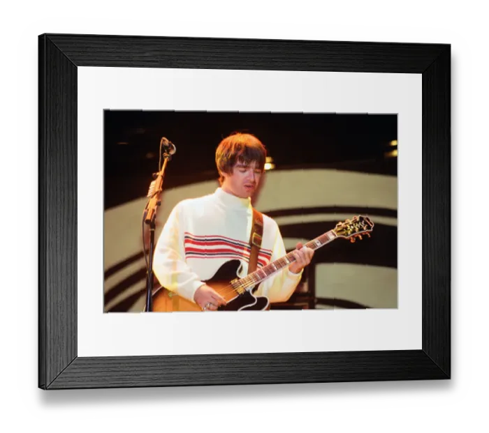 Framed Print : Oasis in concert at Knebworth, Hertfordshire. Noel Gallagher. 11th August 1996