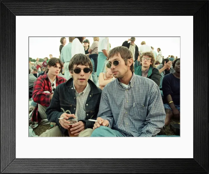 Framed Print : Fans watching Oasis in concert at Knebworth, Hertfordshire. 11th August 1996 Framed Print : Fans watching Oasis in concert at Knebworth, Hertfordshire. 11th August 1996
