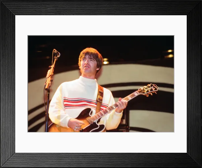 Framed Print : Oasis in concert at Knebworth, Hertfordshire. Noel Gallagher. 11th August 1996 Framed Print : Oasis in concert at Knebworth, Hertfordshire. Noel Gallagher. 11th August 1996