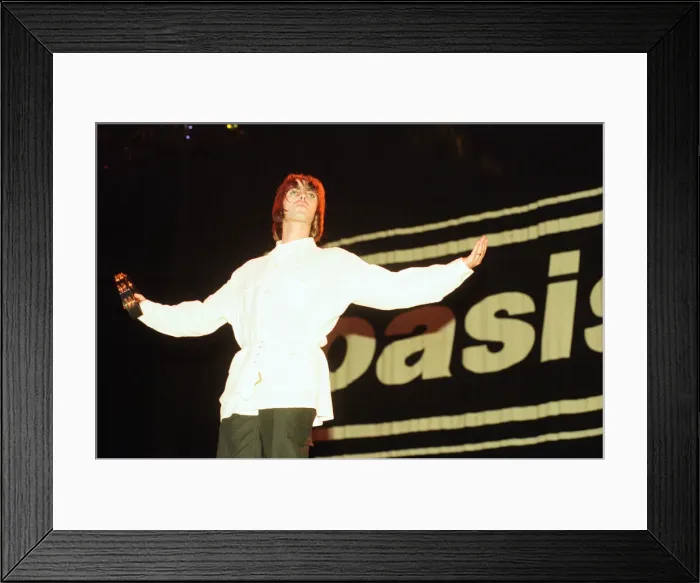 Framed Print : Oasis in concert at Knebworth, Hertfordshire. Liam Gallagher. 11th August 1996 Framed Print : Oasis in concert at Knebworth, Hertfordshire. Liam Gallagher. 11th August 1996