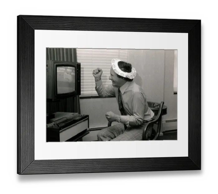 Framed Print : Romark - Hypnotist  /  Magician - 1976 watching a football match on television