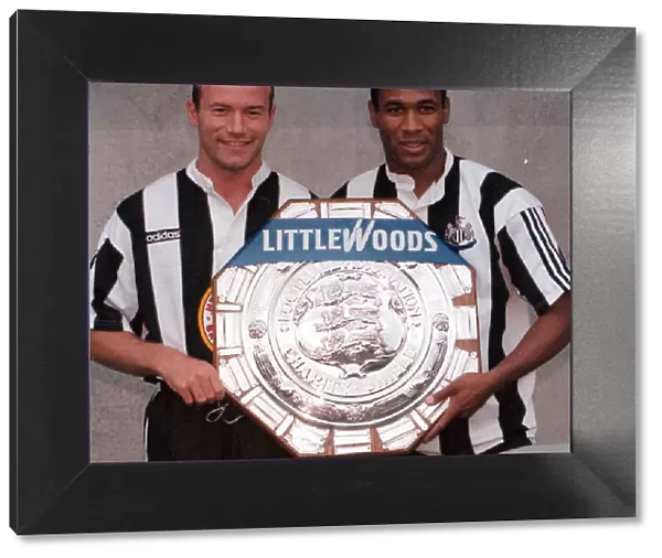 Alan Shearer and Les Ferdinand of Newcastle holding the charity Shield before Sundays