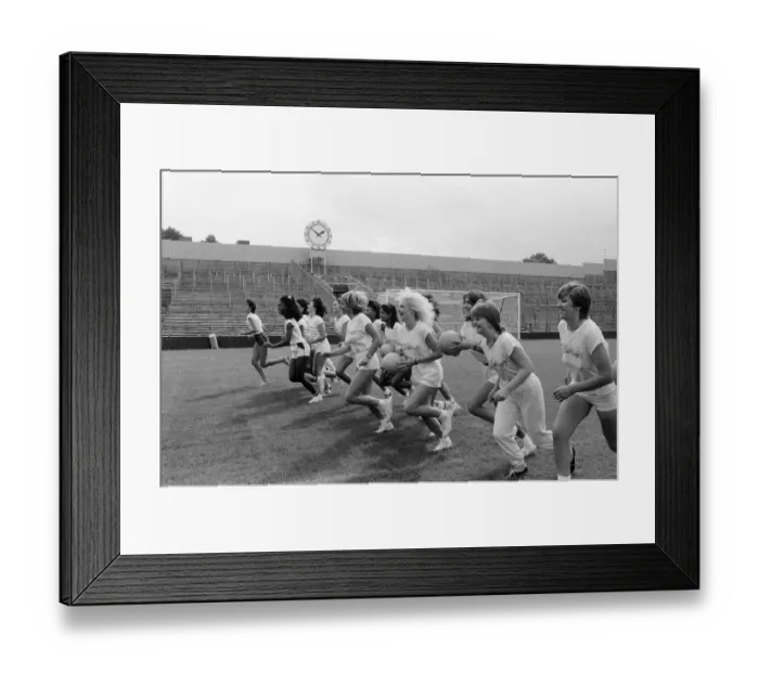 Framed Print : A group of model girls, known as The Exhibitionists, are training for a 5-a-side football Framed Print : A group of model girls, known as The Exhibitionists, are training for a 5-a-side football