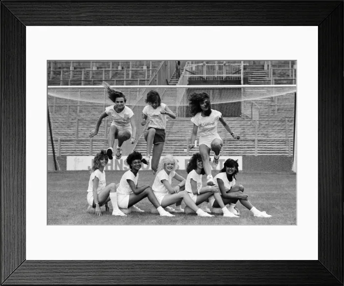 Framed Print : A group of model girls, known as The Exhibitionists, are training for a 5-a-side football Framed Print : A group of model girls, known as The Exhibitionists, are training for a 5-a-side football
