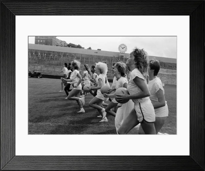 Framed Print : A group of model girls, known as The Exhibitionists, are training for a 5-a-side football Framed Print : A group of model girls, known as The Exhibitionists, are training for a 5-a-side football