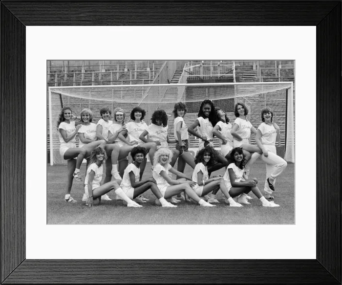 Framed Print : A group of model girls, known as The Exhibitionists, are training for a 5-a-side football