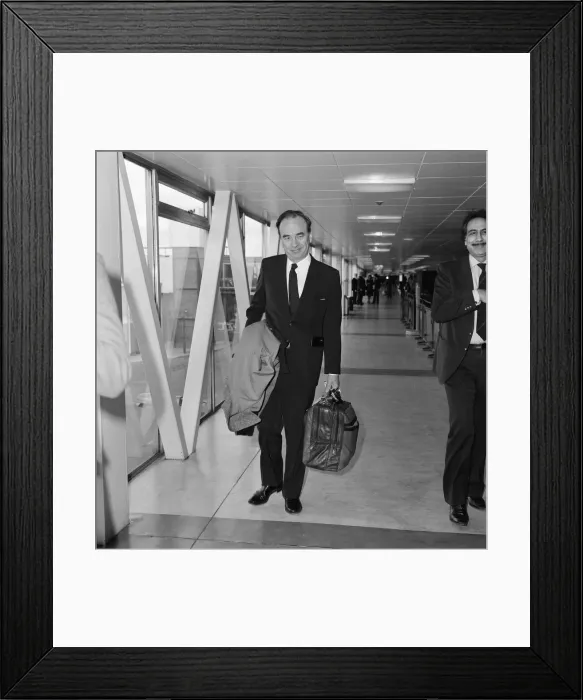 Framed Print : Rupert Murdoch leaving Heathrow airport for New York. 11th March 1982 Framed Print : Rupert Murdoch leaving Heathrow airport for New York. 11th March 1982