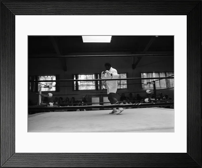 Framed Print : World boxing champion George Foreman trains at the Farigrounds in Pleasanton