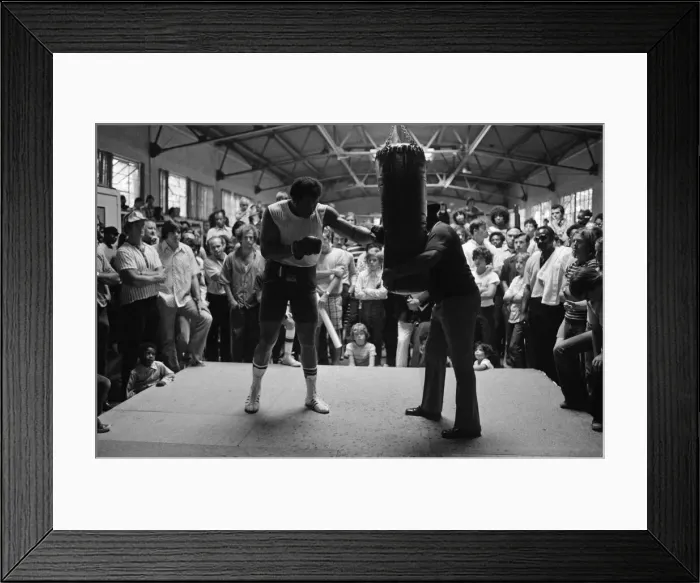 Framed Print : World boxing champion George Foreman trains at the Farigrounds in Pleasanton Framed Print : World boxing champion George Foreman trains at the Farigrounds in Pleasanton