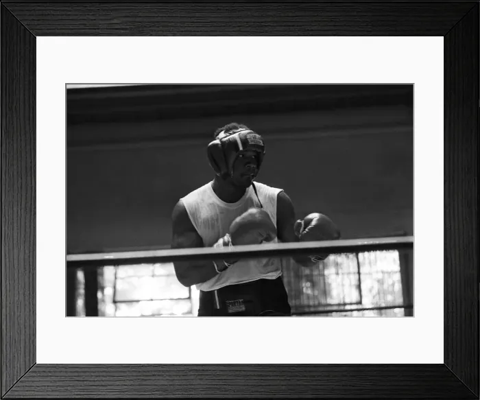 Framed Print : World boxing champion George Foreman trains at the Farigrounds in Pleasanton