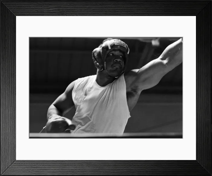 Framed Print : World boxing champion George Foreman trains at the Farigrounds in Pleasanton Framed Print : World boxing champion George Foreman trains at the Farigrounds in Pleasanton