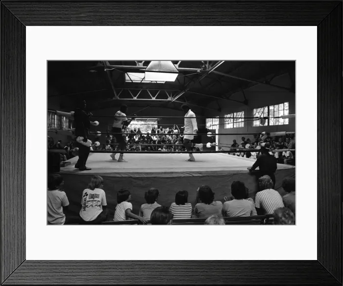 Framed Print : World boxing champion George Foreman trains at the Farigrounds in Pleasanton