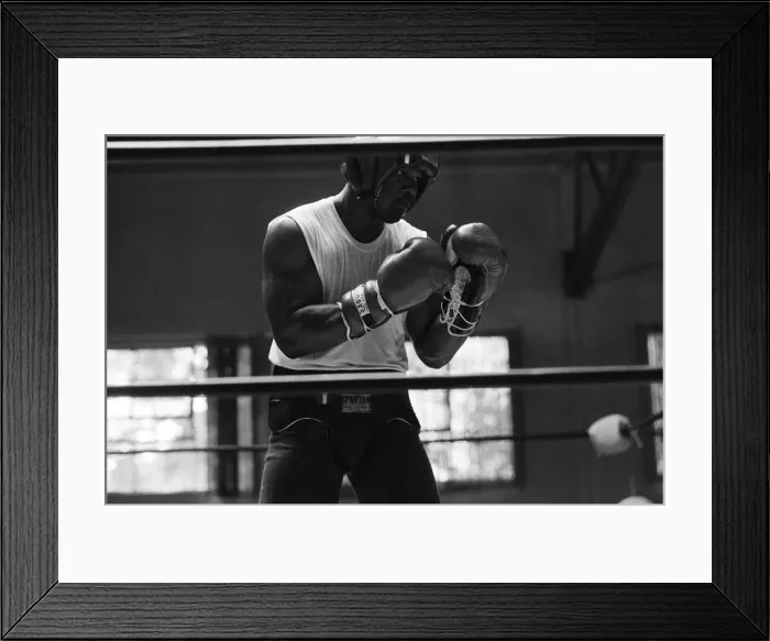 Framed Print : World boxing champion George Foreman trains at the Farigrounds in Pleasanton Framed Print : World boxing champion George Foreman trains at the Farigrounds in Pleasanton