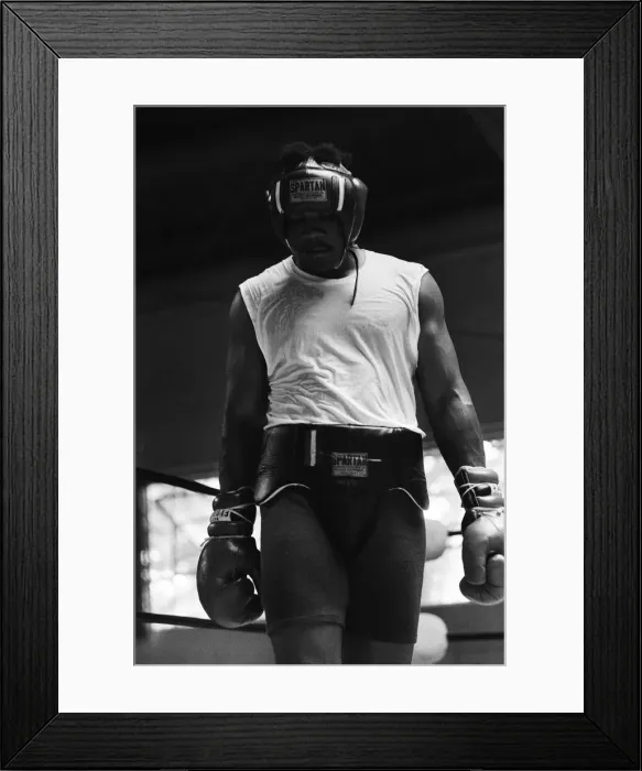 Framed Print : World boxing champion George Foreman trains at the Farigrounds in Pleasanton Framed Print : World boxing champion George Foreman trains at the Farigrounds in Pleasanton