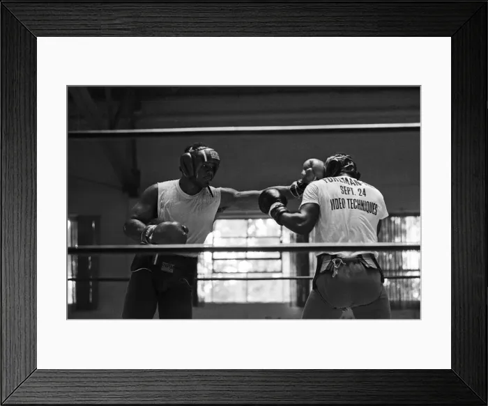 Framed Print : World boxing champion George Foreman trains at the Farigrounds in Pleasanton Framed Print : World boxing champion George Foreman trains at the Farigrounds in Pleasanton
