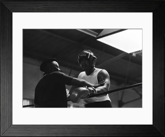 Framed Print : World boxing champion George Foreman trains at the Farigrounds in Pleasanton