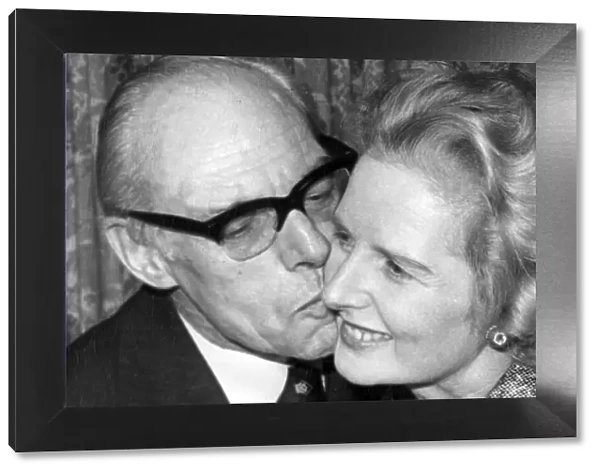 Margaret Thatcher being kissed by husband Denis celebrating her election as leader of
