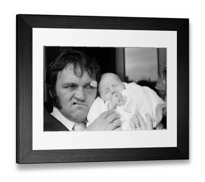 Framed Print : Les Dawson with his baby daughter Pamela Jane at her christening at Cleveleys, Lancashire Framed Print : Les Dawson with his baby daughter Pamela Jane at her christening at Cleveleys, Lancashire