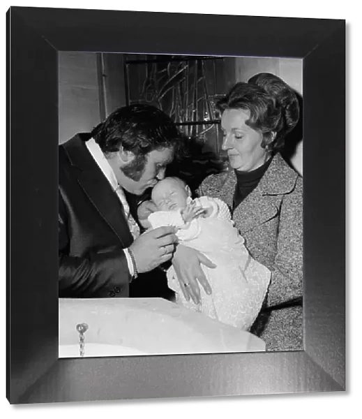 Les Dawson and his wife Margaret at the christening of their baby daughter Pamela Jane at