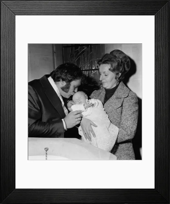 Framed Print : Les Dawson and his wife Margaret at the christening of their baby daughter Pamela Jane Framed Print : Les Dawson and his wife Margaret at the christening of their baby daughter Pamela Jane
