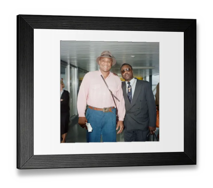 Framed Print : George Foreman and Joe Frazier at London Airport. 16th October 1989