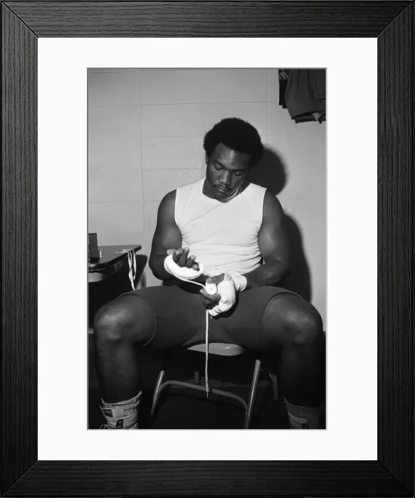 Framed Print : World heavyweight champion George Foreman during a training session at Hayward Boys Club Framed Print : World heavyweight champion George Foreman during a training session at Hayward Boys Club