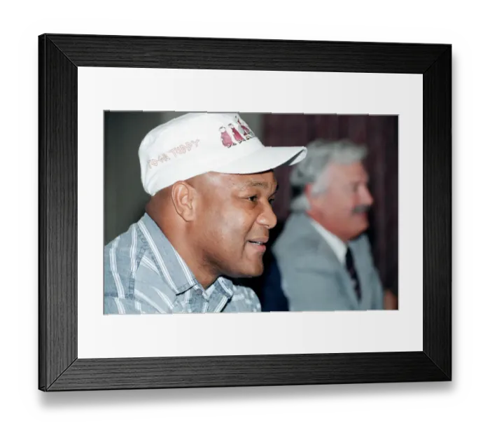 Framed Print : George Foreman at a press conference. 19th September 1990 Framed Print : George Foreman at a press conference. 19th September 1990