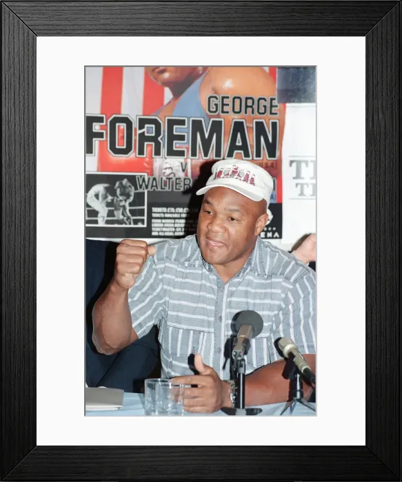 Framed Print : George Foreman at a press conference. 19th September 1990 Framed Print : George Foreman at a press conference. 19th September 1990
