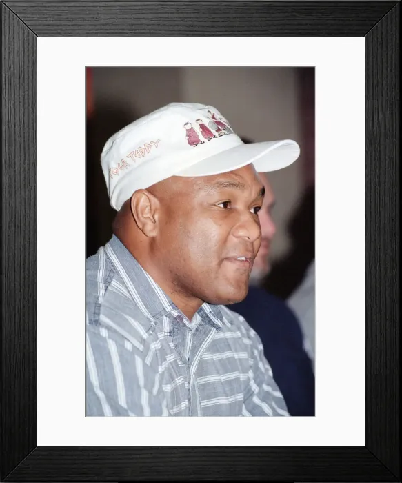 Framed Print : George Foreman at a press conference. 19th September 1990
