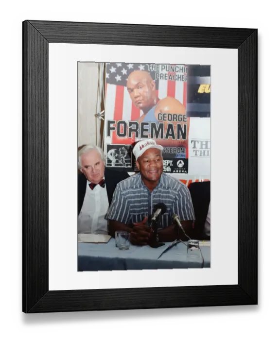 Framed Print : George Foreman at a press conference. 19th September 1990
