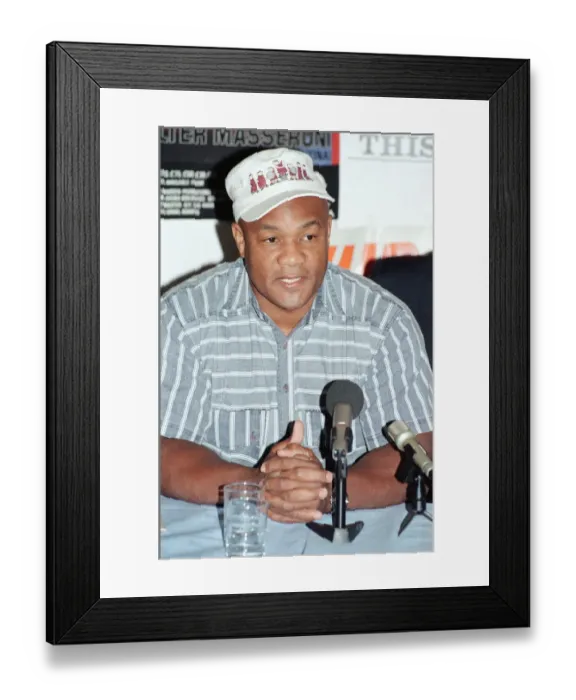 Framed Print : George Foreman at a press conference. 19th September 1990