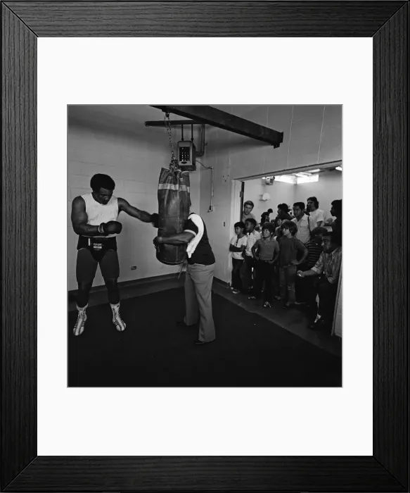 Framed Print : World heavyweight champion George Foreman during a training session at Hayward Boys Club Framed Print : World heavyweight champion George Foreman during a training session at Hayward Boys Club