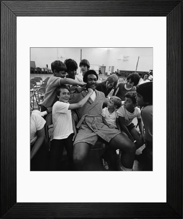 Framed Print : World heavyweight champion George Foreman during a training session at Hayward Boys Club Framed Print : World heavyweight champion George Foreman during a training session at Hayward Boys Club