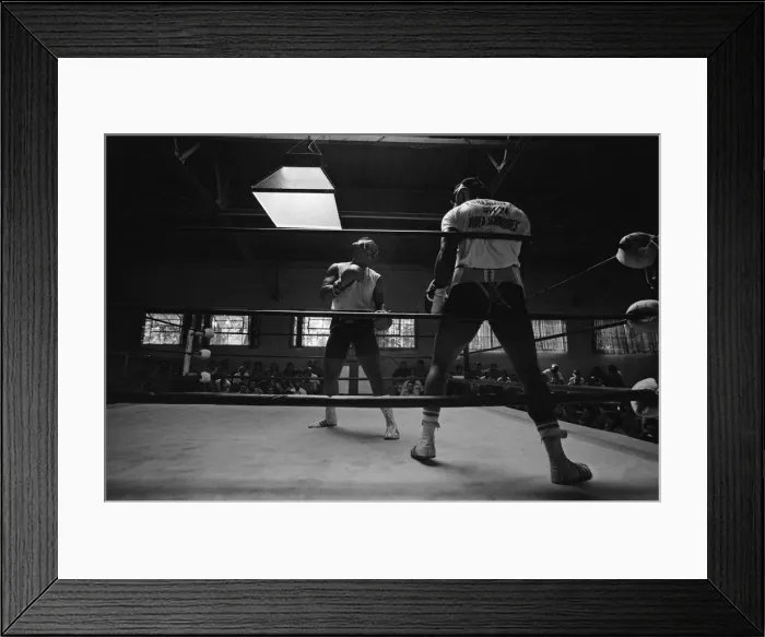 Framed Print : World boxing champion George Foreman trains at the Farigrounds in Pleasanton Framed Print : World boxing champion George Foreman trains at the Farigrounds in Pleasanton