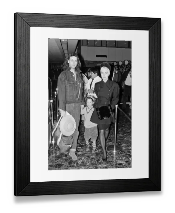 Framed Print : Bob Geldof and Paula Yates at LAP with their daughter Fifi Trixibelle. 30th November 1987 Framed Print : Bob Geldof and Paula Yates at LAP with their daughter Fifi Trixibelle. 30th November 1987