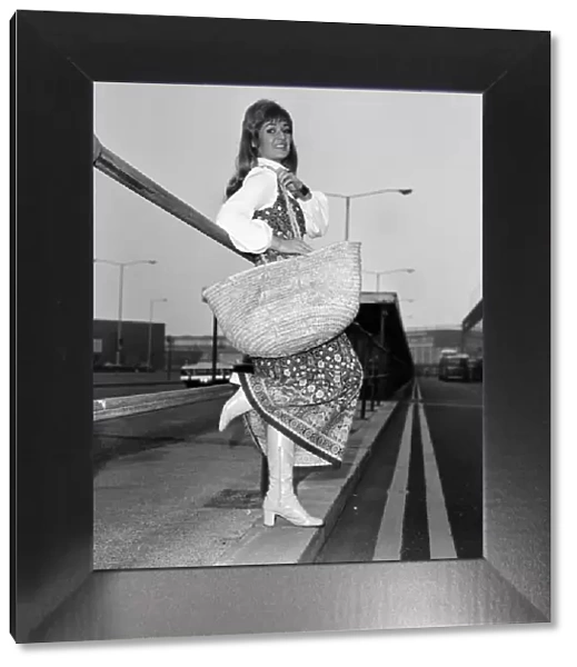 Model Stephanie Beacham leaving Heathrow Airport for Paris. 15th April 1971