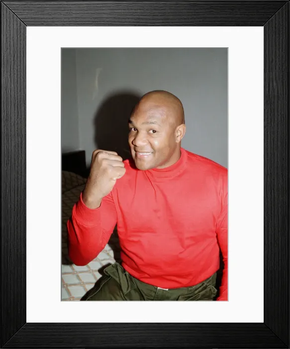 Framed Print : George Foreman pictured in a hotel room. 22nd September 1990 Framed Print : George Foreman pictured in a hotel room. 22nd September 1990
