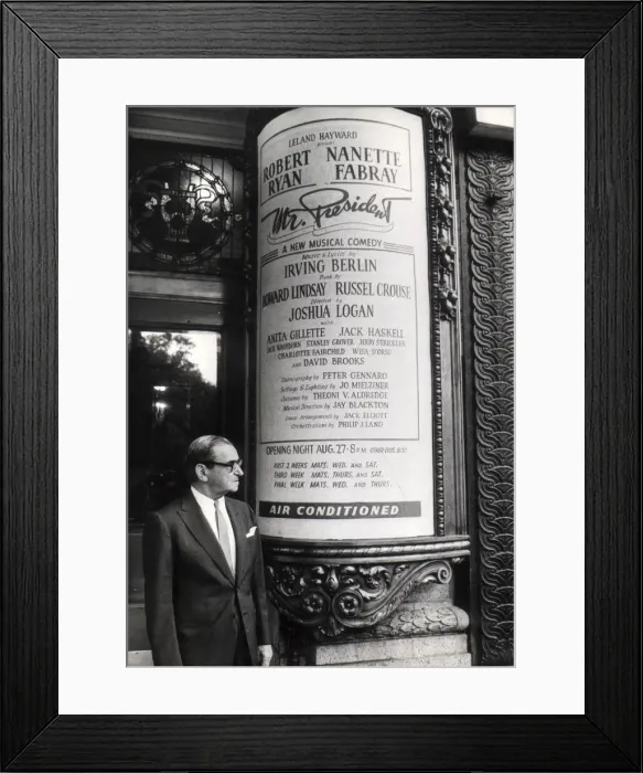 Framed Print : Irving Berlin stood by a poster for his new show, Mr President Framed Print : Irving Berlin stood by a poster for his new show, Mr President