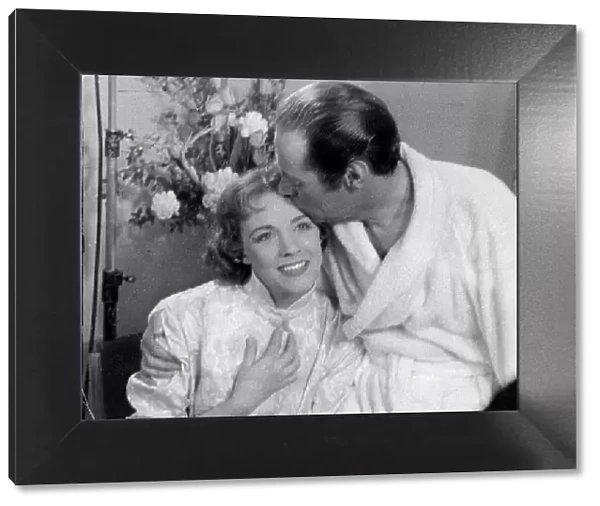 Julie Andrews kissed by Rex Harrison in her dressing room at the Drury Lane Theatre after