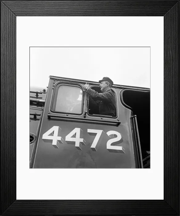 Framed Print : Mr Alan Pegler pictured cleaning The Flying Scotsman Engine window of the drivers cabin Framed Print : Mr Alan Pegler pictured cleaning The Flying Scotsman Engine window of the drivers cabin