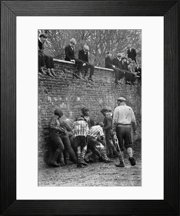 Framed Print : The Wall Game played at Eton College. Near Windsor in Berkshire. 26th November 1966