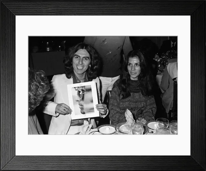 Framed Print : George Harrison and his girlfriend Olivia. 18th November 1976 Framed Print : George Harrison and his girlfriend Olivia. 18th November 1976