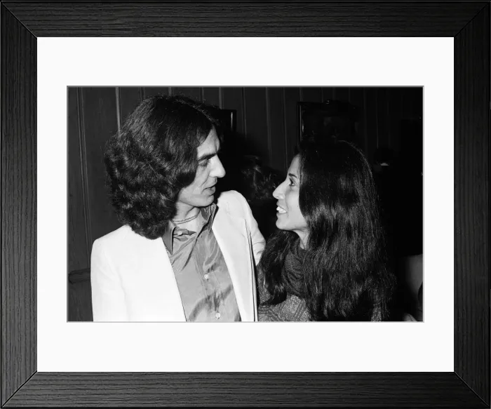 Framed Print : George Harrison and his girlfriend Olivia. 18th November 1976 Framed Print : George Harrison and his girlfriend Olivia. 18th November 1976