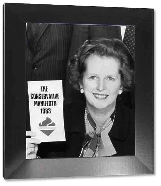 Margaret Thatcher holding 1983 Conservative party manifesto - May 1983