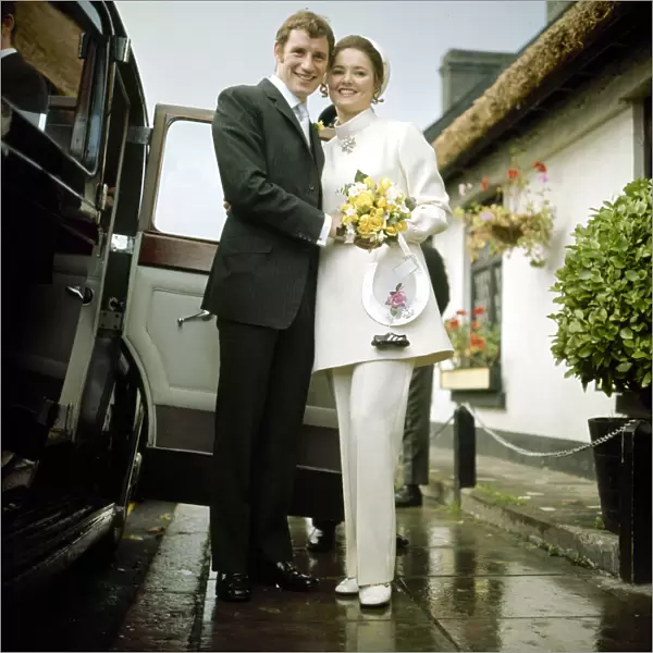 Arsenal and Northern Ireland footballer Terry Neill with his bride Sandra Litchfield